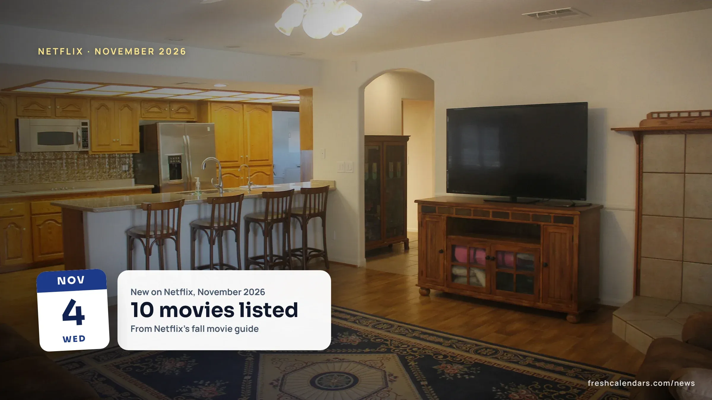 A living room with a flat-screen television on a wooden stand next to an open kitchen