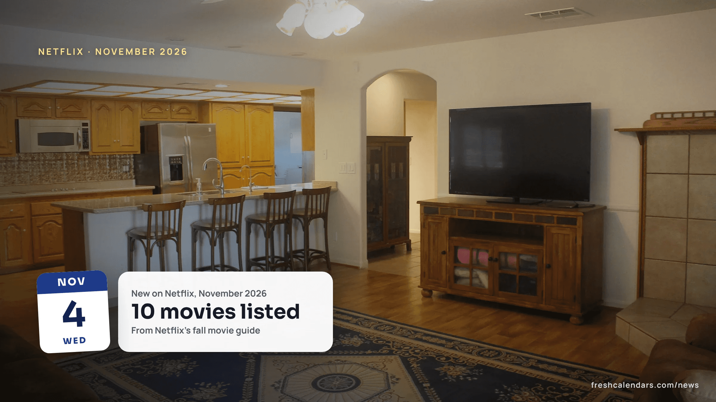 A living room with a flat-screen television on a wooden stand next to an open kitchen